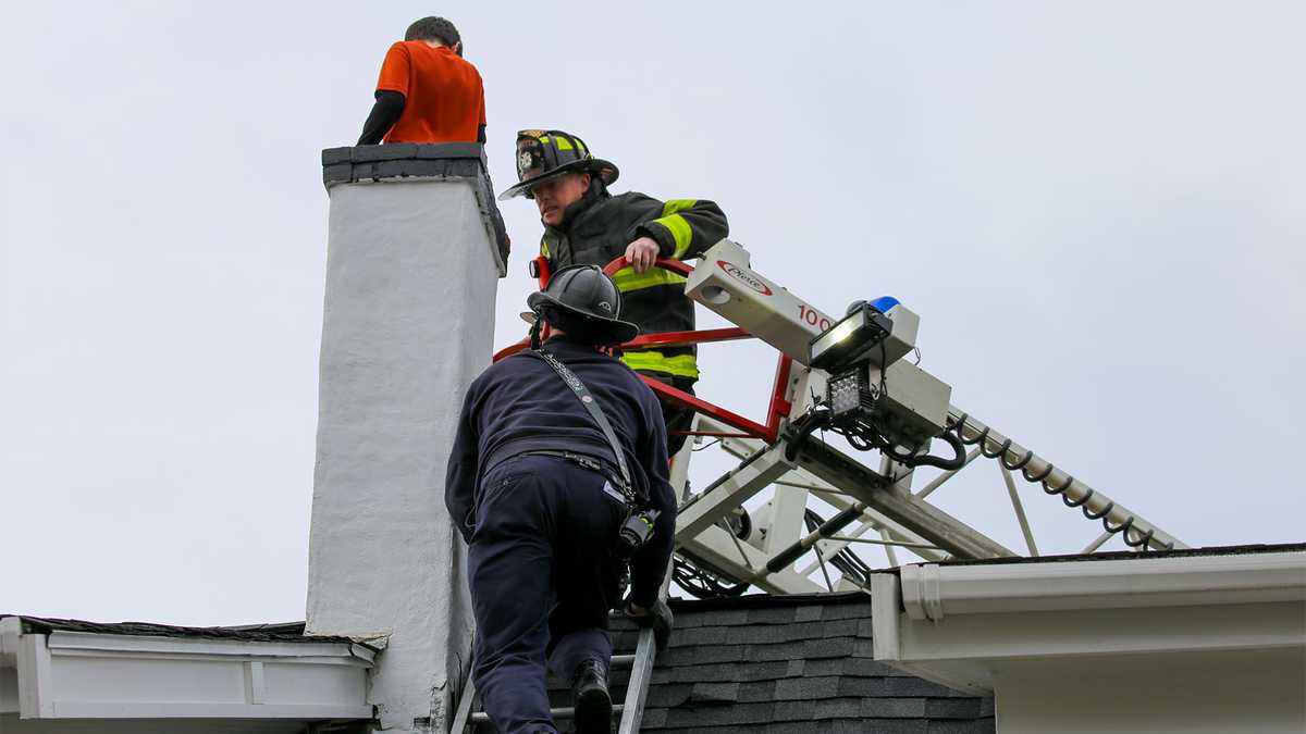 Child rescued after getting stuck in chimney at Whitman home [Video]