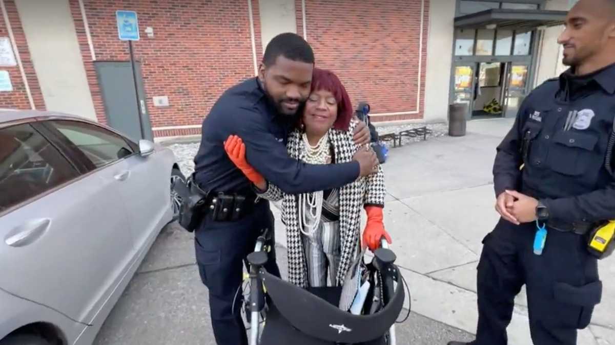 Police officers save woman from falling, buy her groceries [Video]