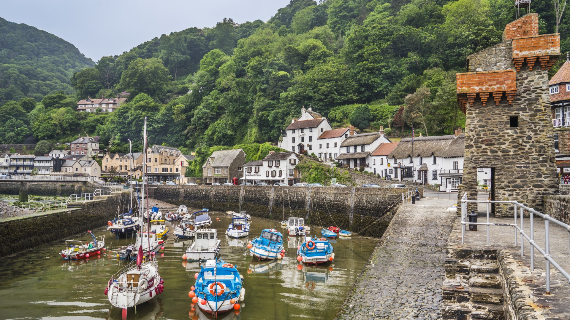 The charming English village with retro cobbled streets and the world